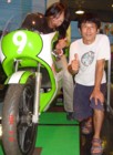 Tono with his wife Hime on the works 250 racer