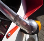 Engineered weak-point on the front brake lever - evidence of it's racing past ?